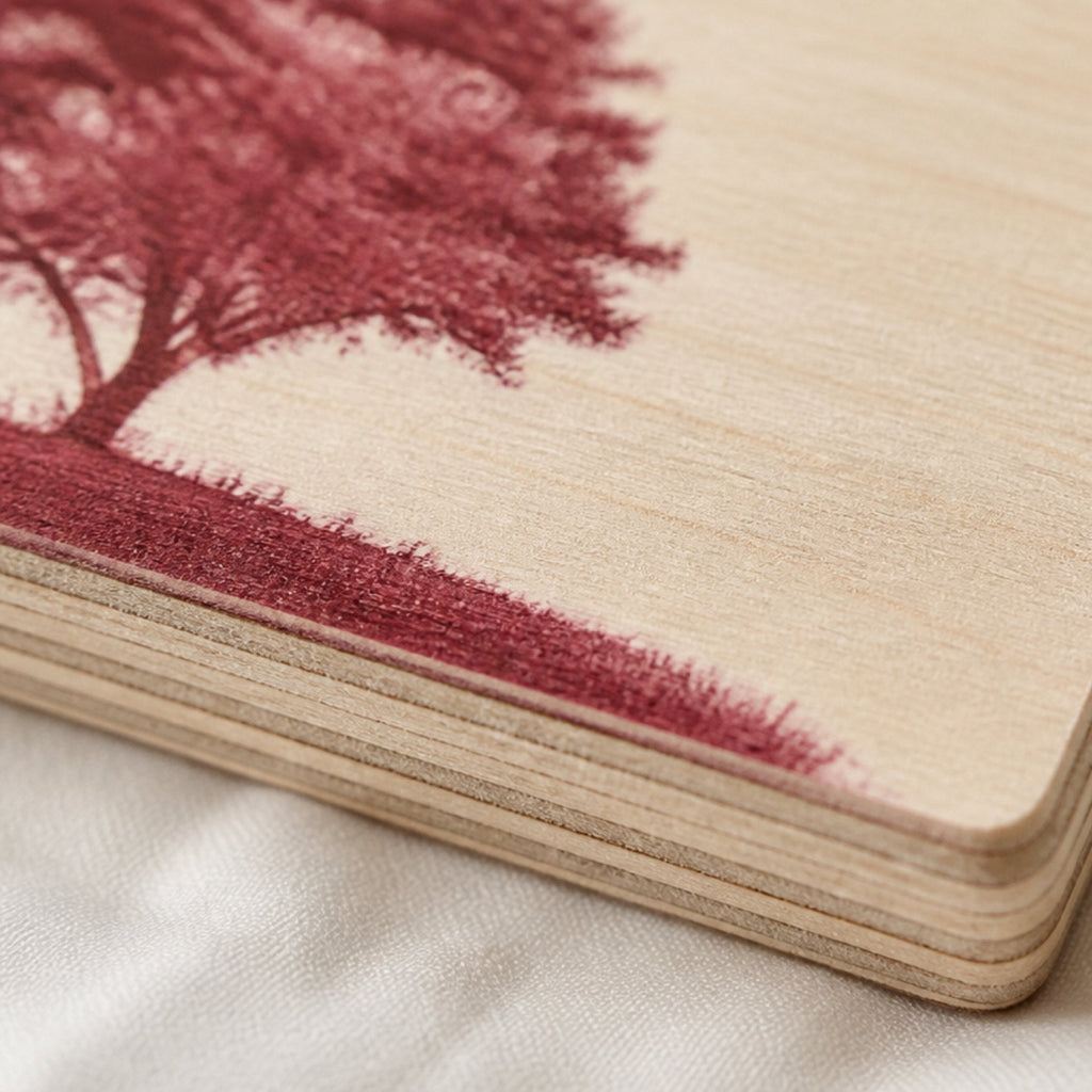Close-up of the plaque corner showing the layered plywood edge and the printed surface